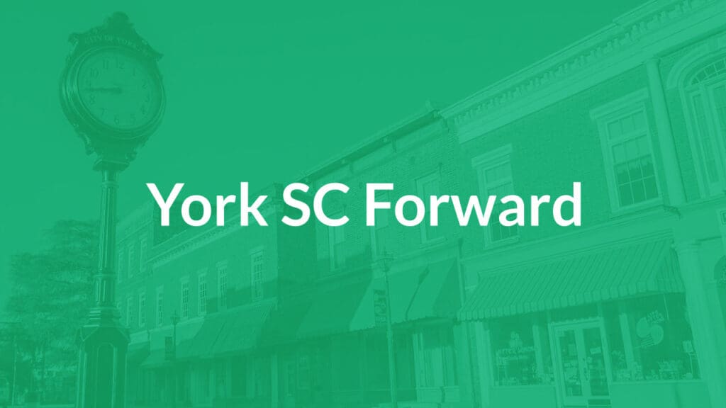 photo of downtown York, SC tinted green with the words "York SC Forward" in the middle